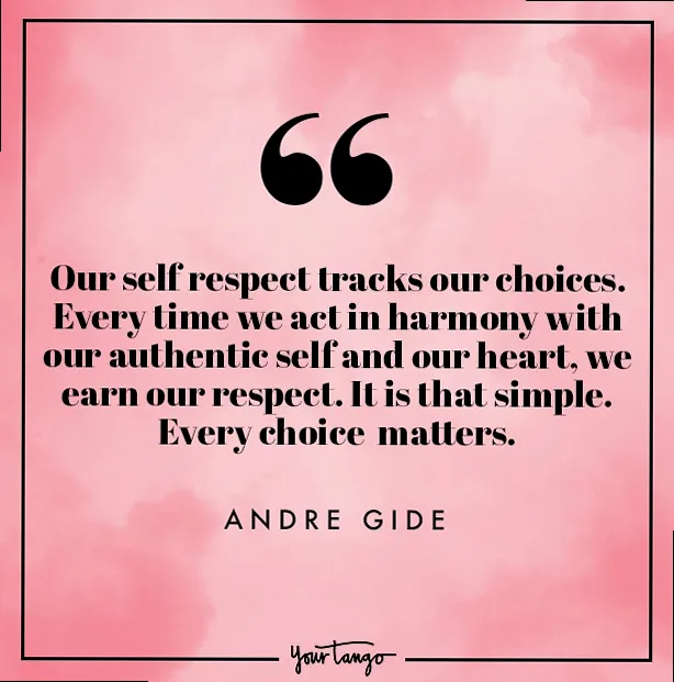 A woman stands confidently with her back to the viewer, arms outstretched, gazing at a vibrant sunset over mountains, symbolizing freedom and living authentically after overcoming heartbreak.