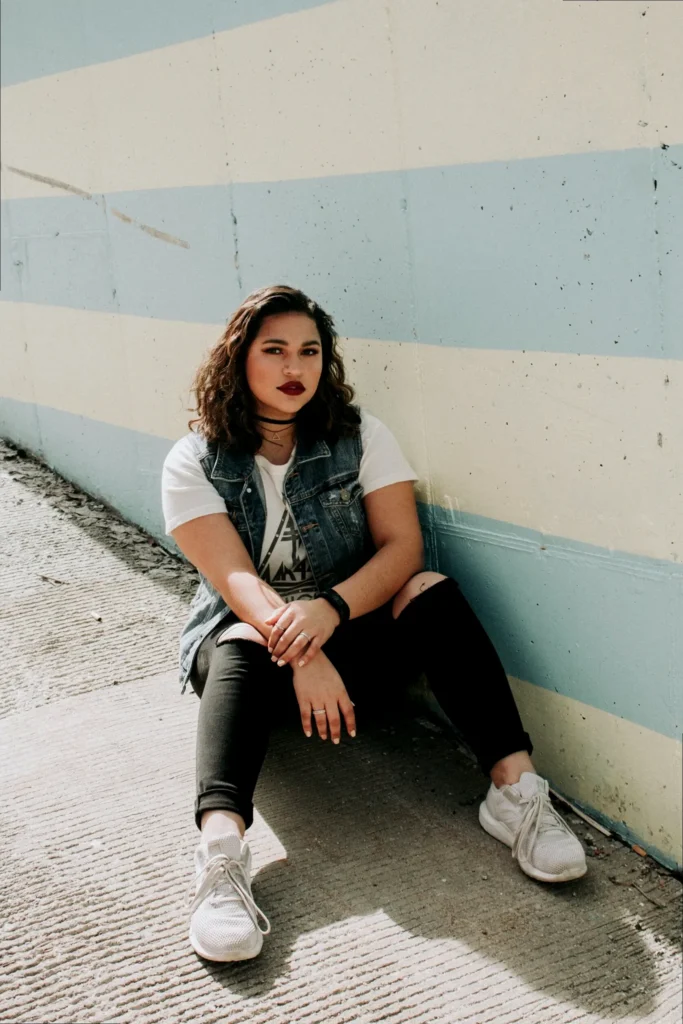 A person exuding extreme confidence and boldness, with an aura of unapologetic self-assurance.