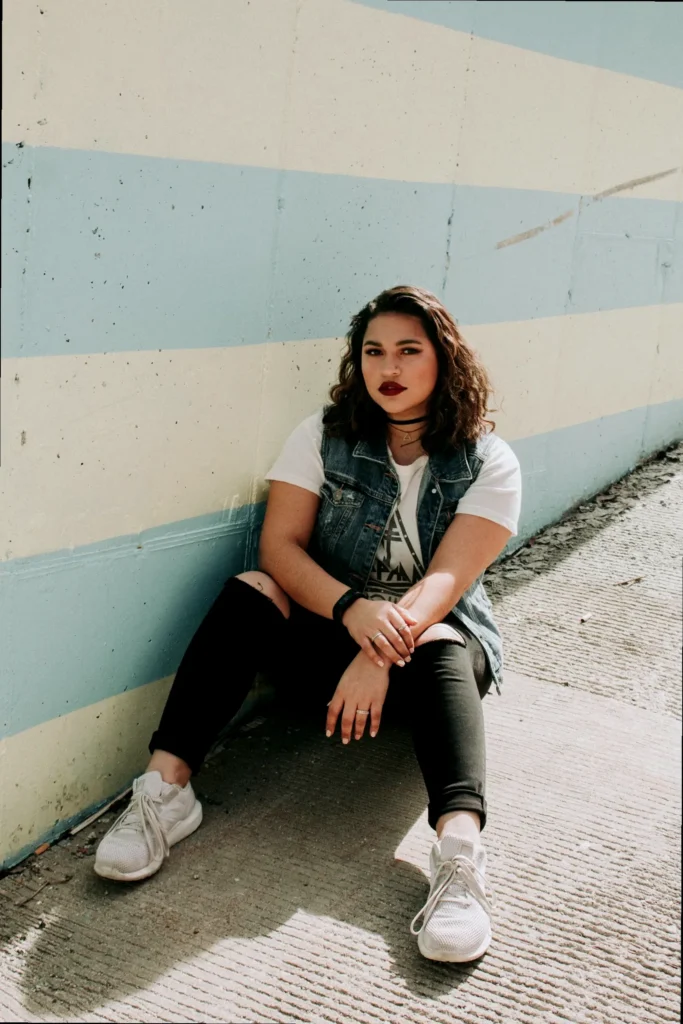 A person exuding extreme confidence and boldness, with an aura of unapologetic self-assurance.