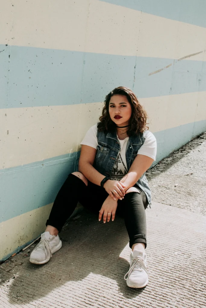 A person exuding extreme confidence and boldness, with an aura of unapologetic self-assurance.