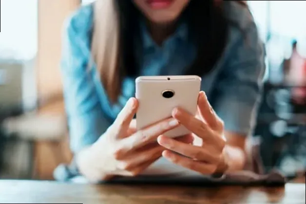 A confident woman looking fierce and powerful, symbolizing 'baddie' and 'queen' energy.