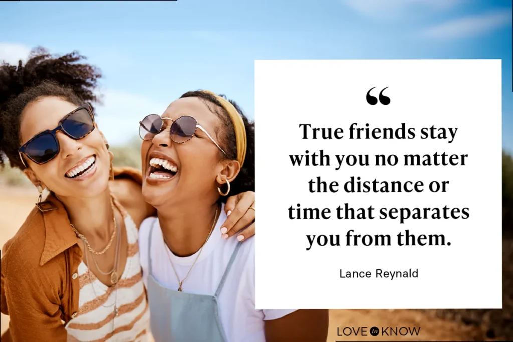 Two friends, one in the foreground, one blurred in the background, walking hand-in-hand, symbolizing an enduring bond despite separation.