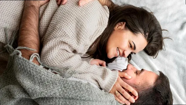 A playful image hinting at romance and intimacy, representing flirty good night messages.