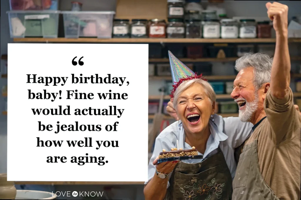 A happy senior couple joyfully celebrating the husband's birthday with laughter and a cake.