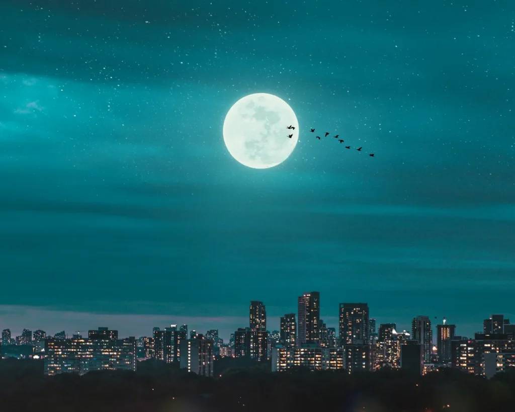 good night messages sent with moon shining in the sky at night at the city