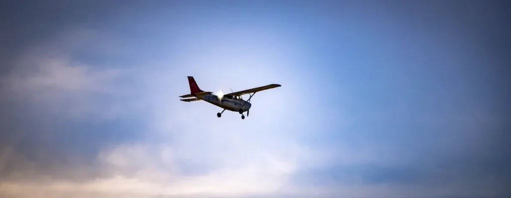 A vintage biplane against a clear sky, symbolizing the enduring passion for flight and aviation.