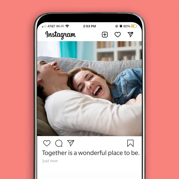 A romantic couple walking hand-in-hand, representing romantic Instagram captions for couples.