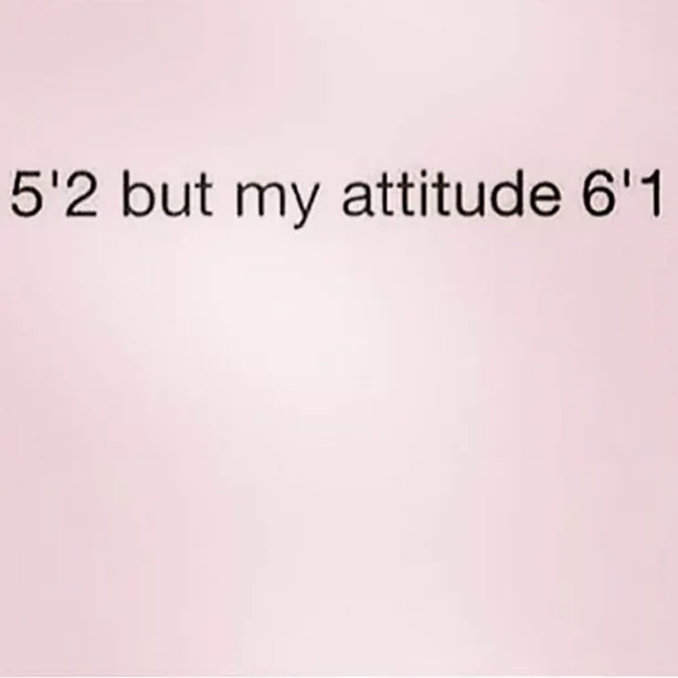 Woman in a stylish suit, exuding professional boss energy.