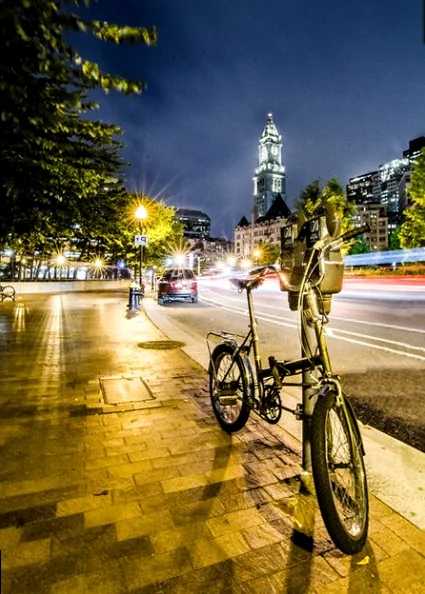 A photographer engaging closely with a subject, creating a comfortable and trusting atmosphere during a shoot.