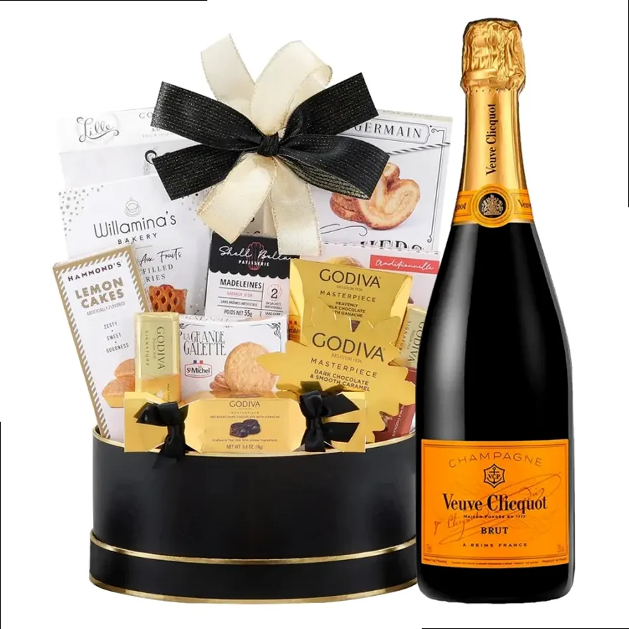 An elegant gift box featuring Veuve Clicquot Brut Champagne and gourmet Godiva chocolates, ideal for a romantic celebration.
