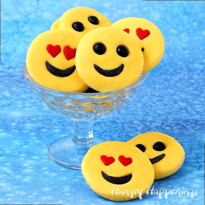 If your kids or friends can't live without using emoji to express their emotions, they will love these sweet smiley face emoji candies made using a simple 2-ingredient fudge recipe. These Easy Fudge Emoji will make fun treats for Valentine's Day or any day.