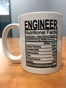 A quirky mug celebrating engineers with a humorous design.