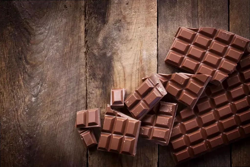 Family sharing chocolate on Chocolate Day, symbolizing heartwarming connections and joy.