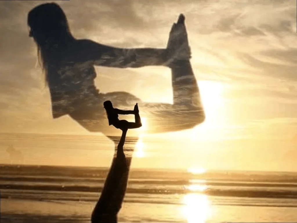 Two people demonstrating a partner yoga pose, emphasizing trust and connection