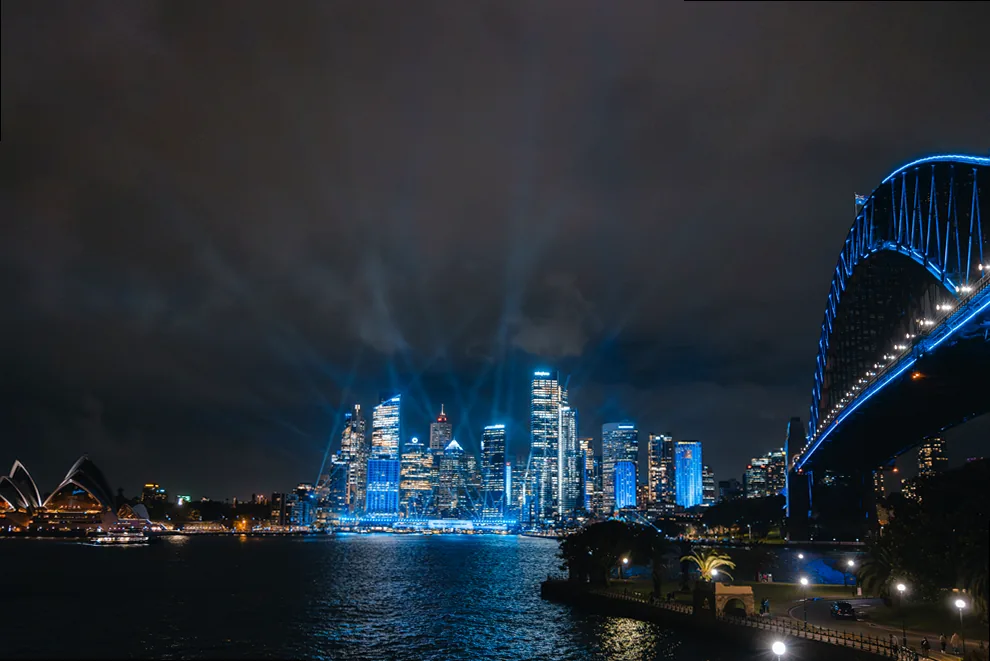 A light installation framed by architectural elements, drawing the eye to the main subject.