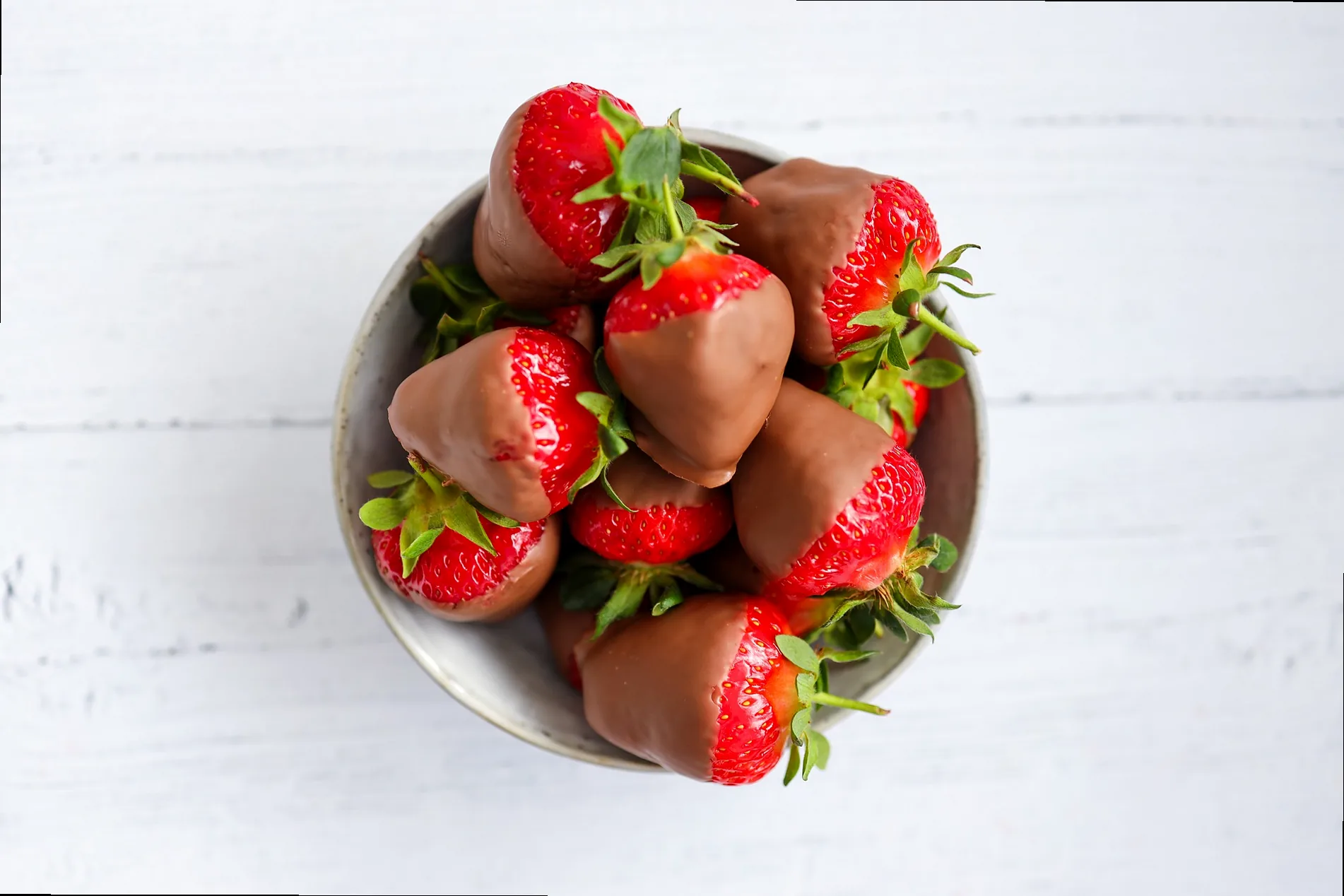 Delicious chocolate-covered strawberries arranged on a platter