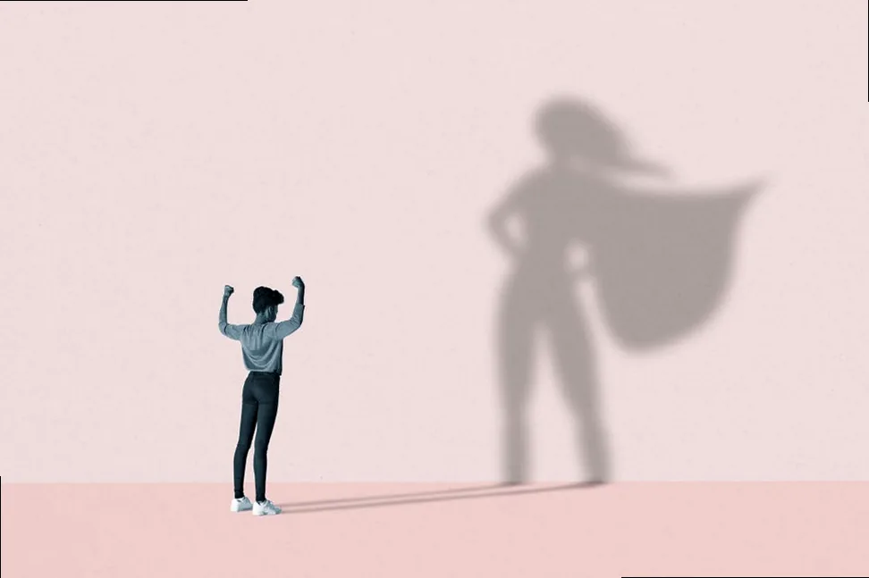 Woman flexing muscles, casting a superhero shadow, symbolizing strength and confidence from a chosen family support system.