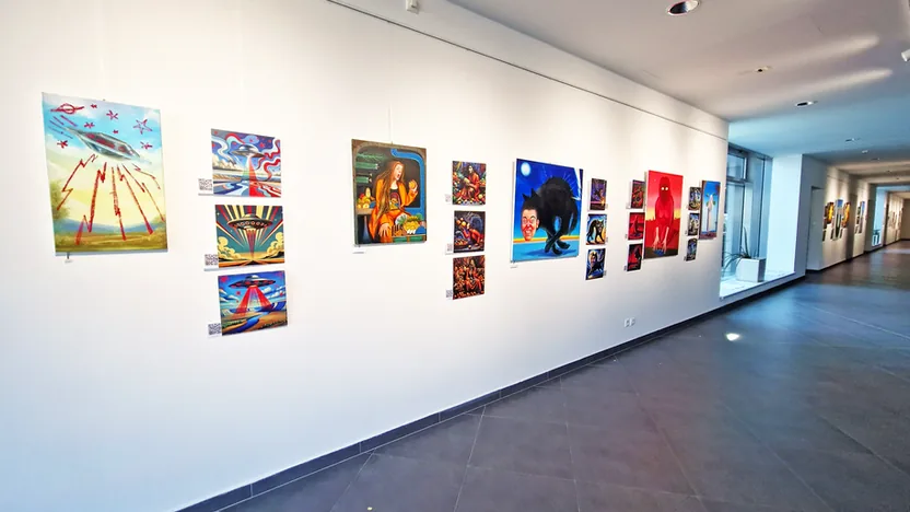 A vibrant abstract painting by Klara Sedlo, showcasing a blend of human creativity and artistic expression in contrast to AI-generated images.