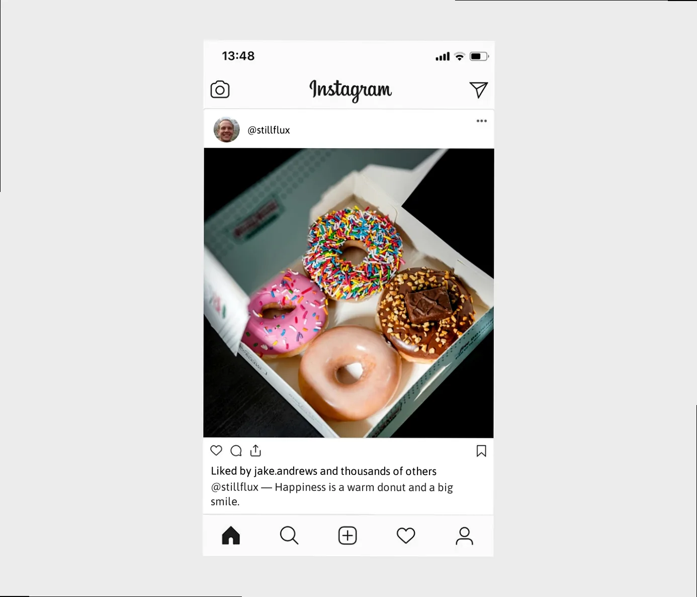 Stylish hand holding a donut with bold, playful energy.